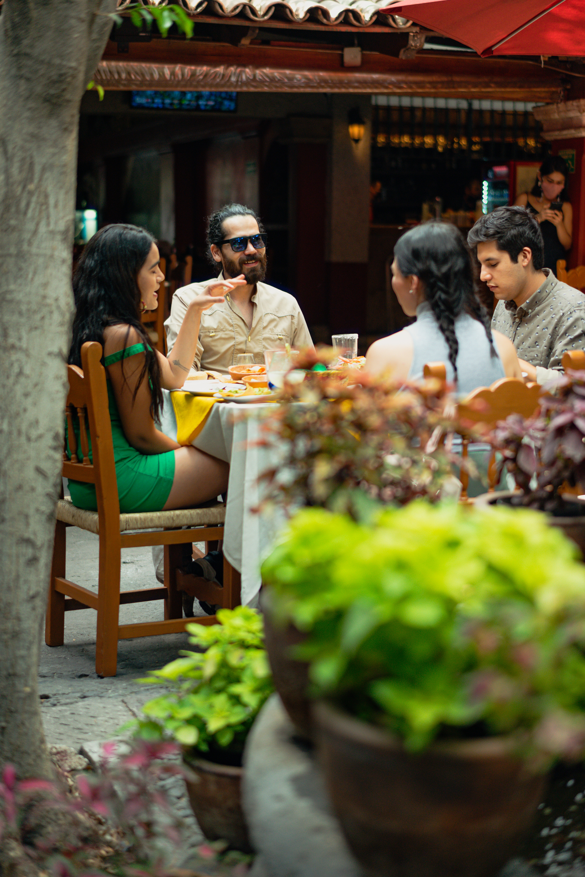 Group of Friends Eating at Mexican Restaurant
